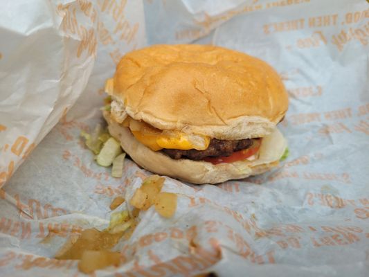 Photo of Mighty Fine Burgers - Austin, TX, US. It was take-out so don't judge the smashness.