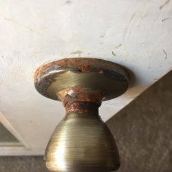 Holden Beach Properties - Corroded door knob.