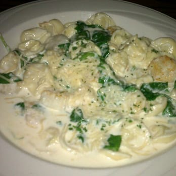 Publick House - Baked scallops with cheese tortillini in Alfredo sauce - Hotels Near Me - Sturbridge, Massachusetts Publick House - Baked scallops with cheese tortillini in Alfredo sauce - Hotels Near Me - Sturbridge, Massachusetts