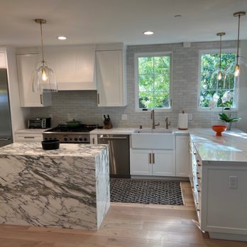 Bay Area Design & Construction - a kitchen with a marble island - General Contractors Near Me - Campbell, California Bay Area Design & Construction - a kitchen with a marble island - General Contractors Near Me - Campbell, California