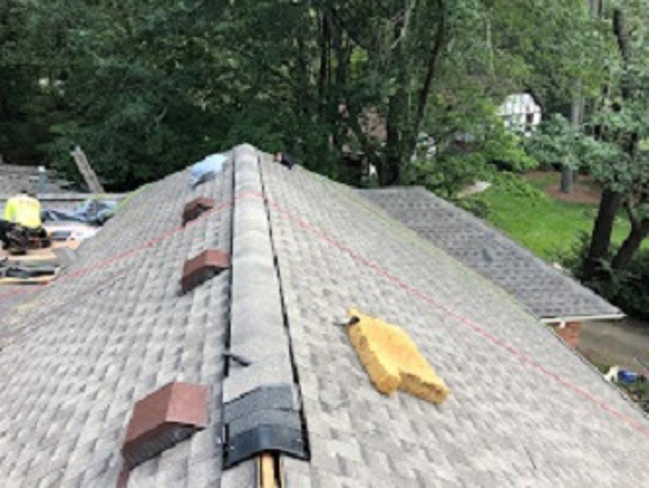 Slide of PMI Roofing & Renovations
