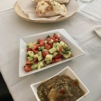 Mado Restaurant - Shepherd Salad and Eggplant Salad with complimentary fresh pita - Mediterranean Near Me - River Edge, New Jersey Mado Restaurant - Shepherd Salad and Eggplant Salad with complimentary fresh pita - Mediterranean Near Me - River Edge, New Jersey