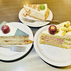 Sweet Life Patisserie - Slice of the London Fog Cake Slice of Chai Spice Cheesecake Pistachio Raspberry Rose Cake