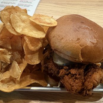Common Roots Brewing - Nashville spicy fried chicken sandwich with freshly-made potato chips. - Breweries Near Me - Albany, New York