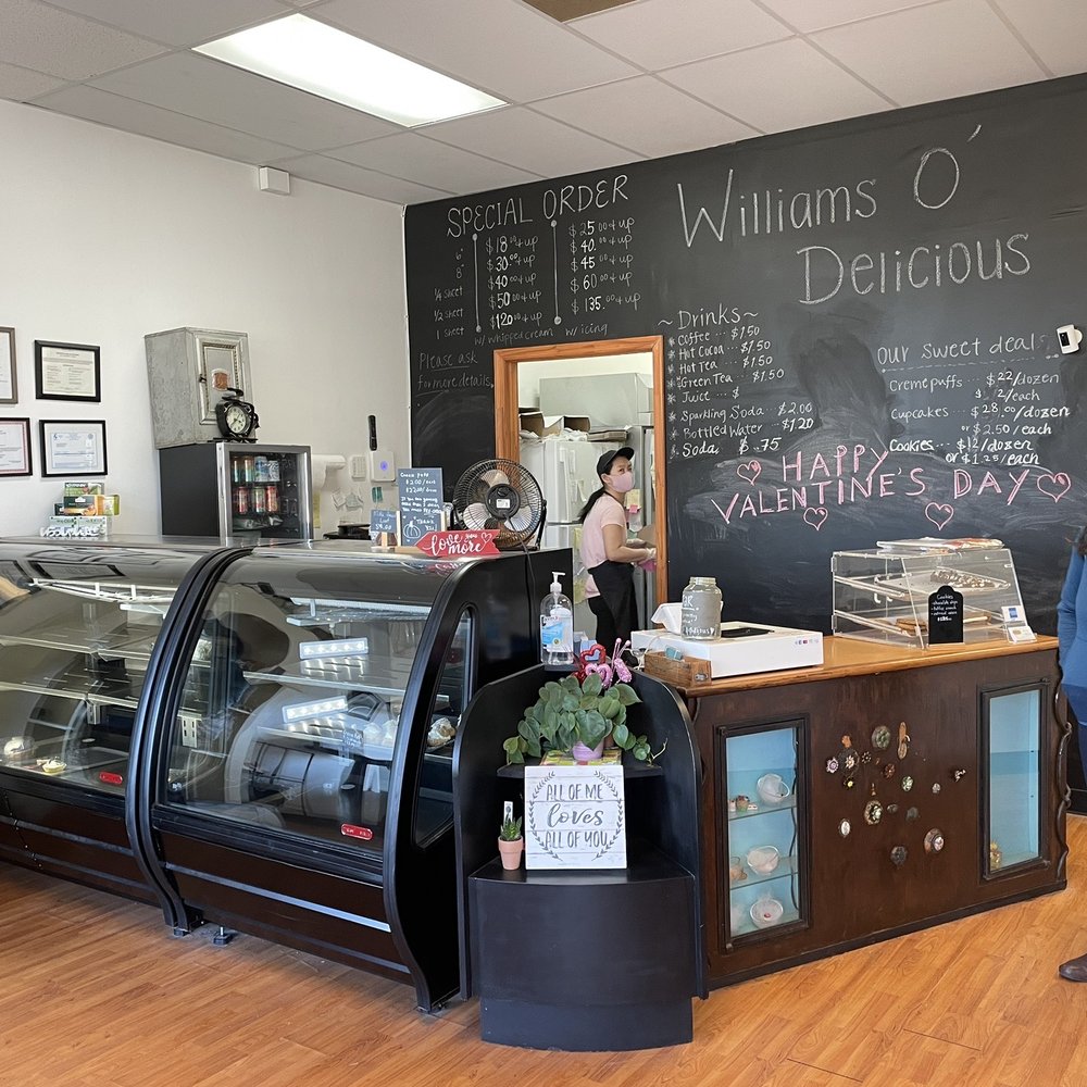 Williams O'delicious - a woman standing in front of a bakery counter - Bakeries Near Me - Hampton, Virginia Williams O'delicious - a woman standing in front of a bakery counter - Bakeries Near Me - Hampton, Virginia