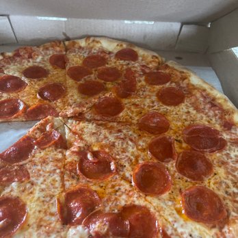 Rocky's Pizzeria and Restaurant - Just a plain pepperoni and cheese but with a slap your momma good taste . Rocky has went toe to toe with other amazing pizza joints .. - Pizza Near Me - Flagler Beach, Florida Rocky's Pizzeria and Restaurant - Just a plain pepperoni and cheese but with a slap your momma good taste . Rocky has went toe to toe with other amazing pizza joints .. - Pizza Near Me - Flagler Beach, Florida