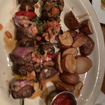 Hennen's - Steak kabobs, tomato basil pesto, red onions and peppers, and grilled potatoes - Steakhouses Near Me - Chattanooga, Tennessee Hennen's - Steak kabobs, tomato basil pesto, red onions and peppers, and grilled potatoes - Steakhouses Near Me - Chattanooga, Tennessee