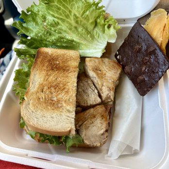The Fleet Deli - Thick tuna steaks, always served with brownie chips and mango slices. - Delis Near Me - Bandon, Oregon The Fleet Deli - Thick tuna steaks, always served with brownie chips and mango slices. - Delis Near Me - Bandon, Oregon