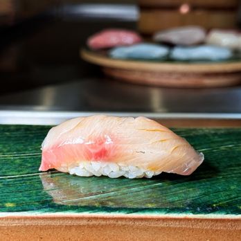 Sushi Ouji - a sushi on a green plate - Sushi Bars Near Me - New York, New York