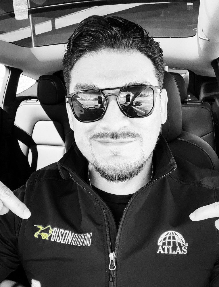 Slide of Bison Roofing