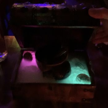 Inside Passage - One Eyed Willy cocktail - served in a skull shaped cup....inside a treasure chest. Brilliant! - Cocktail Bars Near Me - Seattle, Washington Inside Passage - One Eyed Willy cocktail - served in a skull shaped cup....inside a treasure chest. Brilliant! - Cocktail Bars Near Me - Seattle, Washington