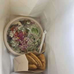 Said bowl with all the veggies and my favorite fried pitas Said bowl with all the veggies and my favorite fried pitas