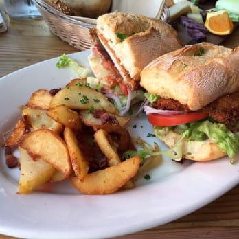 Speisekammer - Wiener Schnitzel Sandwich + side of roasted potatoes - German Near Me - Alameda, California Speisekammer - Wiener Schnitzel Sandwich + side of roasted potatoes - German Near Me - Alameda, California