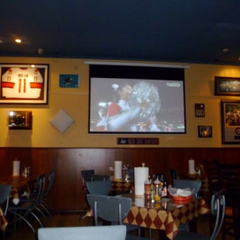 Little Lou's BBQ - big projector tv - Barbeque Near Me - Campbell, California