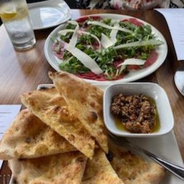 Neapolitan Focaccia (bottom) & Carpaccio di Manzo (top) Neapolitan Focaccia (bottom) & Carpaccio di Manzo (top)