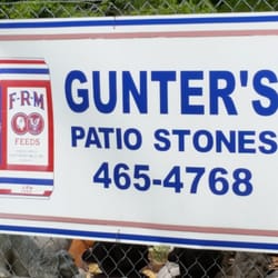 Gunters Farm Feed & Nursery Supplies - Sign on fence