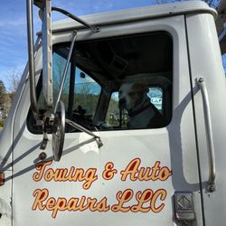 Towing and Auto Repair - Even our Copilot BooBoo is ready to go to work!