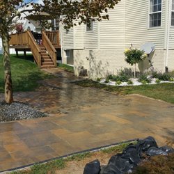 Unique Home and Landscaping Designs - Backyard tiling.