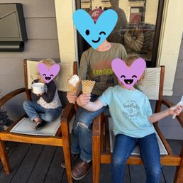 Kids enjoying their ice cream on the porch. Kids enjoying their ice cream on the porch.