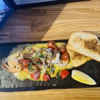 Cavo Bar and Kitchen - a plate of food - Bars Near Me - Vancouver, British Columbia Cavo Bar and Kitchen - a plate of food - Bars Near Me - Vancouver, British Columbia
