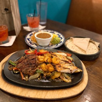 El Torito - Ignited Fajitas Supremas - skirt steak, chicken, & shrimps - yum - Mexican Near Me - Cypress, California El Torito - Ignited Fajitas Supremas - skirt steak, chicken, & shrimps - yum - Mexican Near Me - Cypress, California
