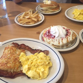 IHOP - White chocolate raspberry pancakes, scrambled eggs, bacon, and hash browns - American Near Me - Dundalk, Maryland