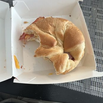 Jack in the Box - This is a croissant sandwich with ham, cheese, and egg and bacon. The ham was very thin. The bacon was tasteless and the bun was very dry. - Tacos Near Me - Clearfield, Utah