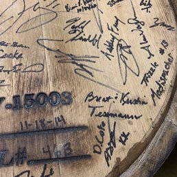 a barrel with signatures on it a barrel with signatures on it