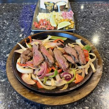 Hard Rock Cafe - Grilled Steak Famous Fajitas - American Near Me - Myrtle Beach, South Carolina Hard Rock Cafe - Grilled Steak Famous Fajitas - American Near Me - Myrtle Beach, South Carolina