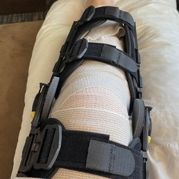 a person with a cast on their leg