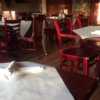Zeus Cafe - tables and chairs in a restaurant - Mediterranean Near Me - Lafayette, Louisiana