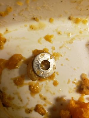 Photo of Territory - Alexandria, VA, US. Metal washer found in food I was eating ordered through Territory