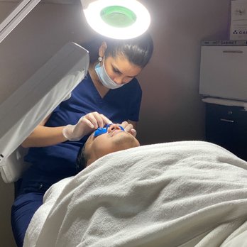 Dalia's Skin Boutique - Dalia applying the solution - Skin Care Near Me - Corona, California