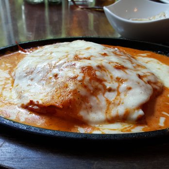 Jack Allen's Kitchen - Chicken enchilada casserole w/ fried egg on the side - American Near Me - Austin, Texas
