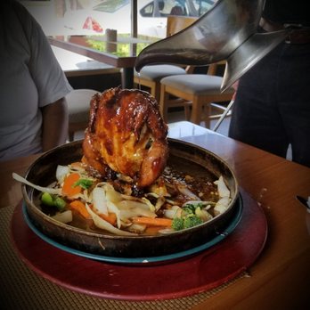 Time 4 Thai - Volcano Cornish Hen. They set it ON FIRE AT YOUR TABLE so COOL. Tons, of veggies. A tad messy but good. - Thai Near Me - Louisville, Kentucky