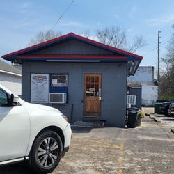 What A Burger - 4 barstools inside to sit. There's 1 picnic table out front. It's basically a drive in with a waitress that comes to your car for your order