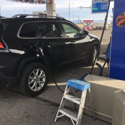 Queen City Exxon - All the windows washed inside and out, vacuuming entire interior, tire pressure, they even took the rubber mats and scrubbed them clean!