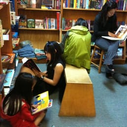 Relaxing with their books.... Relaxing with their books....