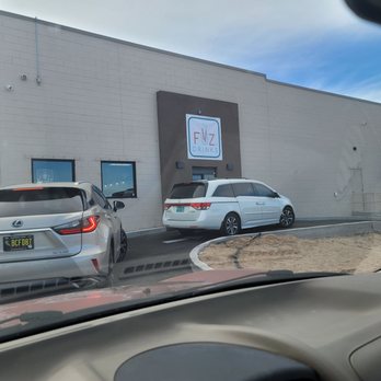 FiiZ Drinks - two cars parked in front of a building - Juice Bars & Smoothies Near Me - Rio Rancho, New Mexico
