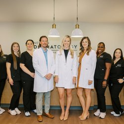 Newnan Dermatology - Our physicians and team at the front desk.