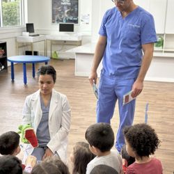 Dental Arts Studio - Dr. Maelys Aguila-Mitchell (general dentist) and Dr. William Mitchell (orthodontist) doing a presentation for our local amazing explorers.