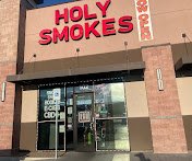 Vegas’s Best Prices & Widest Selection—Vapes, Glass, Kratom & More - Holy Smokes Smoke Shop: Las Vegas’s Favorite Destination for Variety, Value, and Vibes

Discover why locals call Holy Smokes Smoke Shop their go-to spot for all things smoke and vape! Located at 59420 W Russell Rd Ste 102, Las Vegas, NV 89148, we pride ourselves on offering the city’s widest selection, friendliest service, and best prices—guaranteed.

Why Choose Holy Smokes?
Unlike ordinary smoke shops, we believe shopping for your favorite products should feel like visiting friends. That’s why, from the moment you walk in, you’ll notice our warm atmosphere, knowledgeable staff, and shelves stocked with everything you need and more. Whether you’re a first-timer or a longtime enthusiast, we treat you like family.

We carry an extensive variety, including:

Vapes & e-liquids (including Geekbar favorites)
Premium kratom
Hookahs & shisha
Cigars & cigarettes
Water pipes, hand pipes, and high-quality glass
Grinders, body jewelry, and accessories
Exotic drinks & unique finds
At Holy Smokes, we’re committed to keeping our prices fair and competitive. We want you to leave happy—not just with your purchase, but with the experience of being truly valued.

Our Story
Founded in 2020 by Khalid M., Holy Smokes was built on the simple idea that Las Vegas deserved a smoke shop that puts customers first. Frustrated with limited choices and impersonal service at other stores, Khalid set out to create a shop where you could always find what you’re looking for, get honest advice, and shop in a chill and welcoming environment. Over time, Holy Smokes has grown into a local favorite, trusted for both our product variety and our dedication to every customer’s experience.

A Local Favorite, For Good Reason
Community means everything to us—and our loyal customers are proof that when you combine selection, service, and unbeatable deals, people notice. We’re constantly updating our inventory to bring you the latest trends and products, so there’s always something new to discover.

Ready to see what makes us special?
Find us at 59420 W Russell Rd Ste 102, Las Vegas, NV 89148—right where value and good vibes meet.

Mention Yelp during your visit for exclusive perks and discover why Holy Smokes Smoke Shop is Las Vegas’s must-try spot for all things smoke!