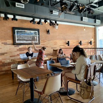 Bluetree Cafe - Kaka'ako - Upstairs seating area tucked away from the sun. Ideal for escaping the afternoon heat. - Coffee & Tea Near Me - Honolulu, Hawaii