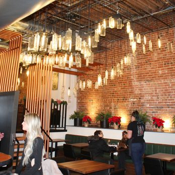 Deviation Distilling - Deviation Distilling had a warm and inviting ambience with exposed brick, copper and barrel accents, and amazing bottle lighting. - Distilleries Near Me - Denver, Colorado Deviation Distilling - Deviation Distilling had a warm and inviting ambience with exposed brick, copper and barrel accents, and amazing bottle lighting. - Distilleries Near Me - Denver, Colorado