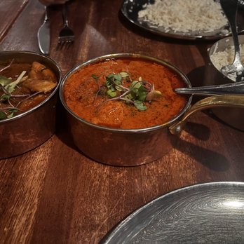 Khan Saab Desi Craft Kitchen - Classic Chicken Curry on the left and Butter Chicken on the right - Pakistani Near Me - Fullerton, California Khan Saab Desi Craft Kitchen - Classic Chicken Curry on the left and Butter Chicken on the right - Pakistani Near Me - Fullerton, California