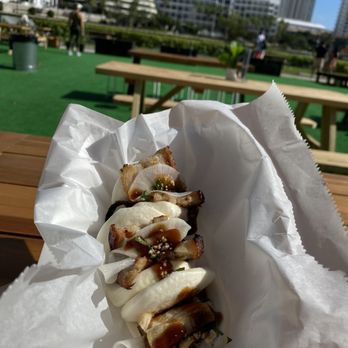 Barra Limeña - a close up of a sandwich in a wrapper - Food Trucks Near Me Barra Limeña - a close up of a sandwich in a wrapper - Food Trucks Near Me