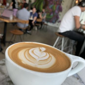 Vice City Bean - Almond/macadamia latte and view of the inside of the cafe - Coffee & Tea Near Me - Miami, Florida