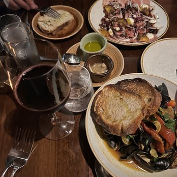 Via Emilia - - Sourdough Bread & olive oil for the table - Speck E Zucca - Zappa Di Cozze - Italian Near Me - Mystic, Connecticut Via Emilia - - Sourdough Bread & olive oil for the table - Speck E Zucca - Zappa Di Cozze - Italian Near Me - Mystic, Connecticut