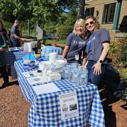 Townhall II - Staff members handing out free lunch at our community picnic.