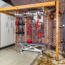 Somatic Physical Therapy - Redcord and Neurac Therapy treatment for movement pattern assessments and stabilization training